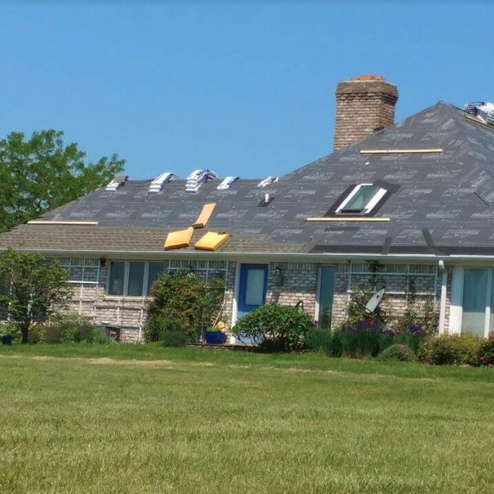 shingles stacked on a roof ready to install.