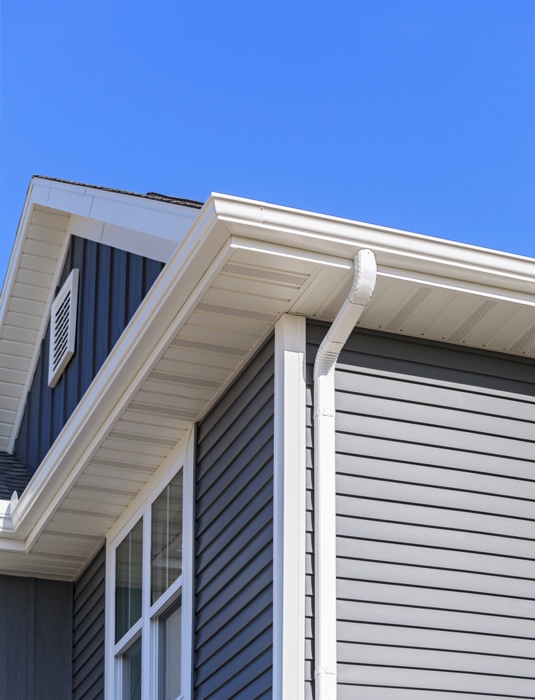 gutters and downspouts on a new house