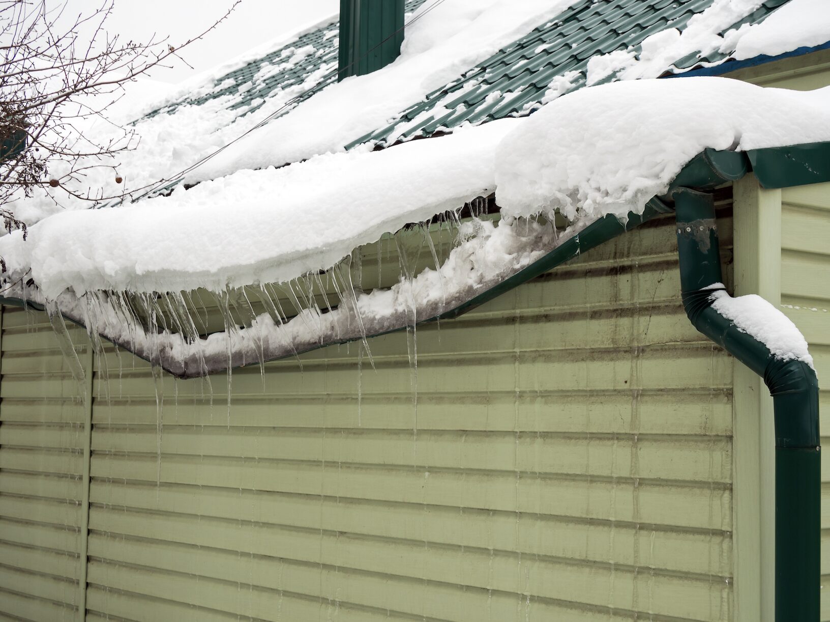 Damaged gutter from snow and ice